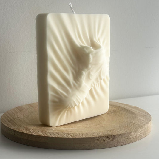 Retro sneaker sculptural candle inspired by iconic basketball shoes on display